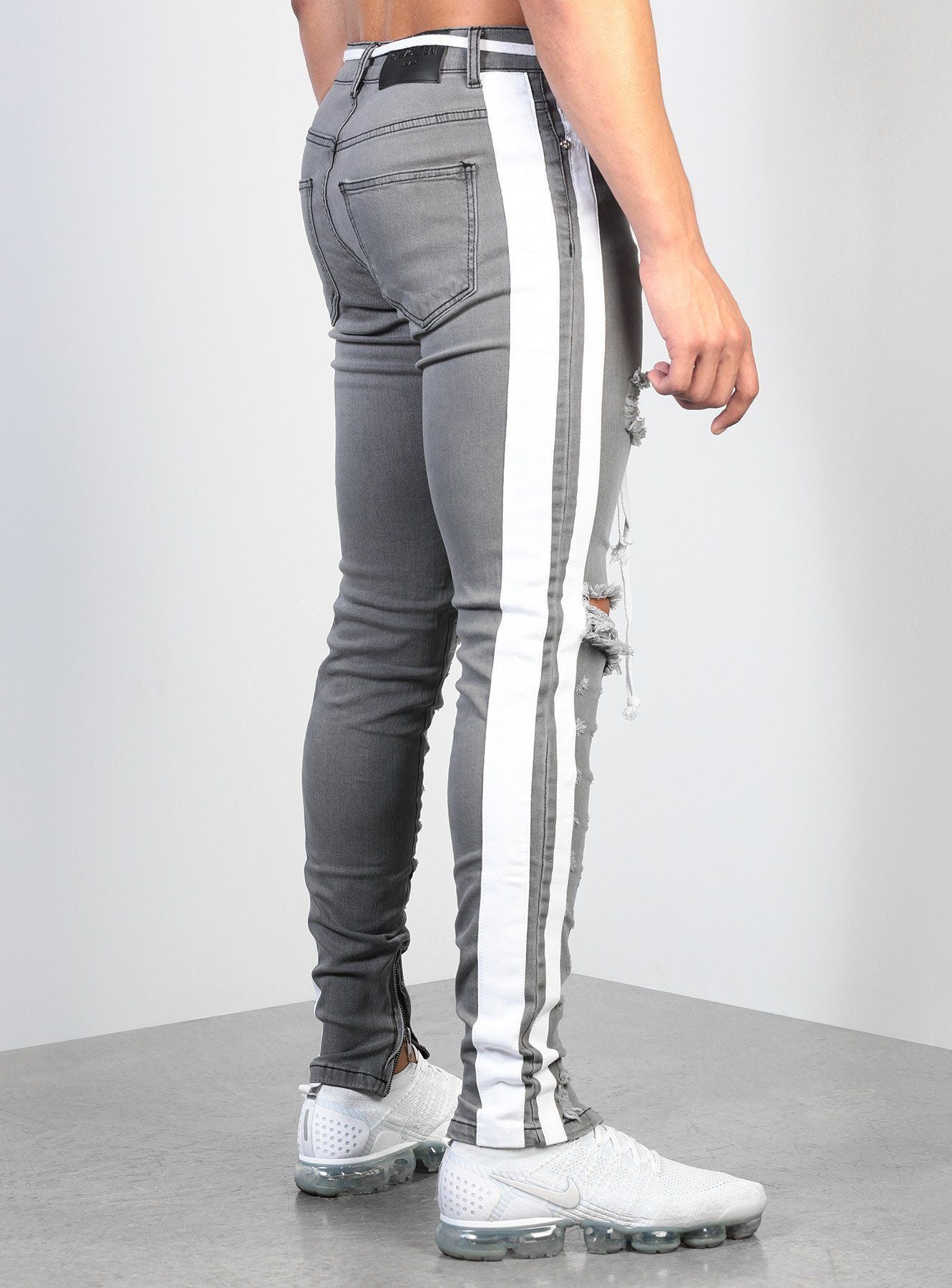 Cross Knee Ripped Zipper Jeans